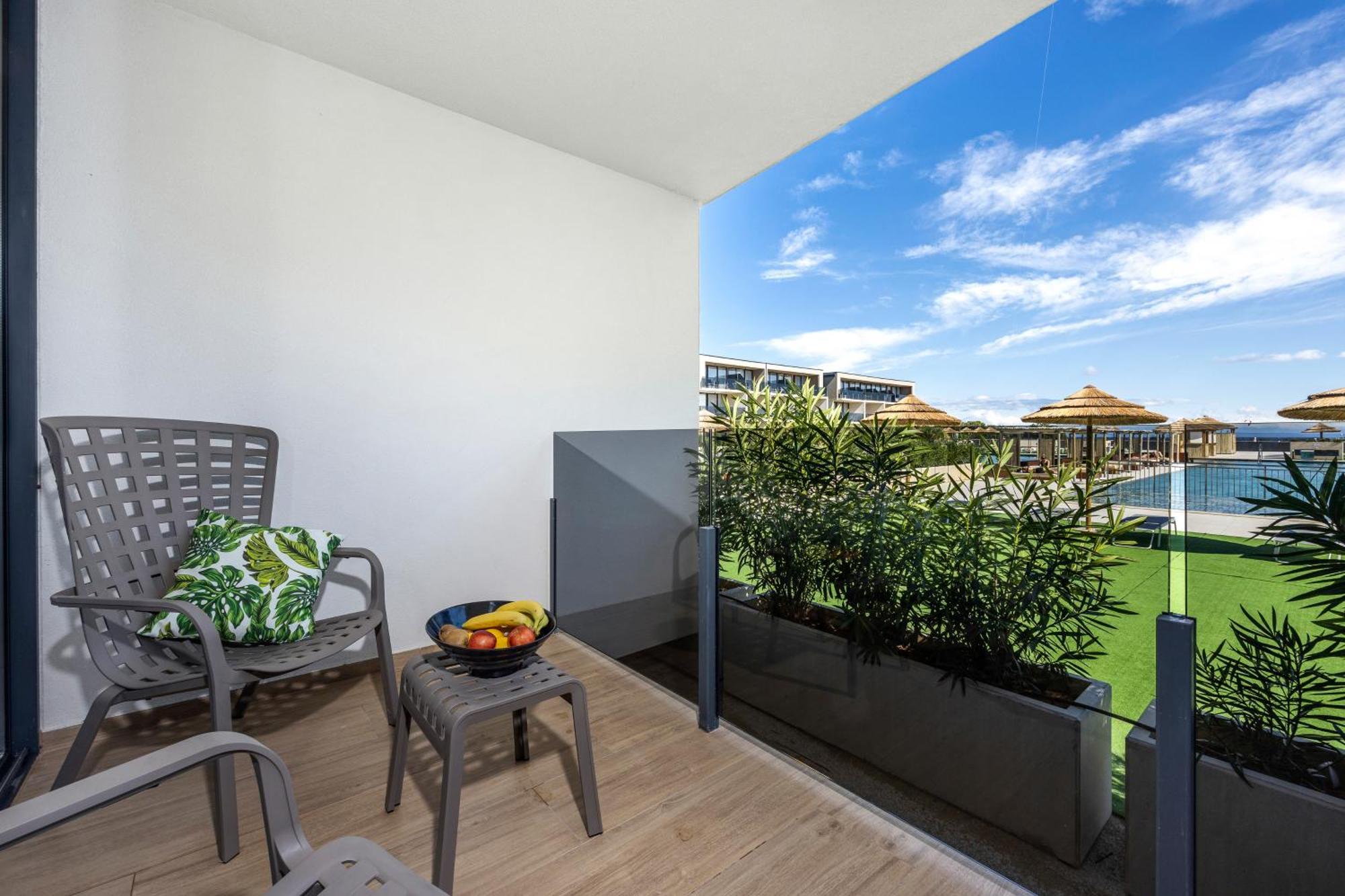 Camera Quadrupla Superior con Balcone - Lato Piscina